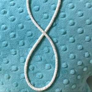 Two small sized puka shell necklaces